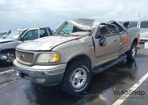 2003 Ford F-150 Lariat/Xlt z USA, uszkodzony, nr VIN 1FTRW08613KA21012